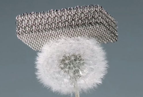 Boeing has revealed the world's lightest metal structure, which it claims is 99.99% hollow.The revolutionary breakthrough claims to be 100 times lighter than Styrofoam and could be the future for aeronautical design, and is so light that is can sit atop a dandelion.Called a microlattice, it is so strong the firm says an egg wrapped in the material would survive a 25 story drop .It is a 3D open-cellular polymer structure made up of interconnected hollow tubes, each with a wall 1,000 times thinner than a human hair.