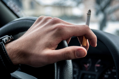 A law banning smoking in vehicles carrying children has come into force in England and Wales. Drivers and passengers who break the law could face a penalty fine of £50 - but police say they will take a non-confrontational approach initially.Whenever an under-18 is in the car, smokers will still be liable even if the windows are down or sunroof open.But the law will not apply to people who are driving in a convertible which has the roof down. The Scottish Parliament is expected to consider bringing in its own law banning smoking in cars carrying children next year. More than 430,000 children are exposed to second-hand smoke in cars each week.