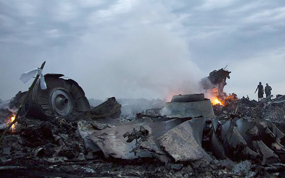 The Dutch Safety Board is to publish a final report on why Malaysian Airlines Flight MH17 broke up over Ukraine in 2014, killing all 298 on board.Preliminary findings say it was hit by "high-energy objects from outside the aircraft", fuelling speculation that a surface-to-air missile was responsible.The West and Ukraine say Russian-backed rebels brought down the Boeing 777, while Russia blames Ukraine. But the report will not say who was to blame. Moscow is to issue its own report.The plane - flying from Amsterdam to Kuala Lumpur - crashed in rebel-held eastern Ukraine on 17 July 2014 at the height of the conflict between government troops and the pro-Russian separatists.